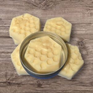 Solid beeswax lotion bar in lemon oil